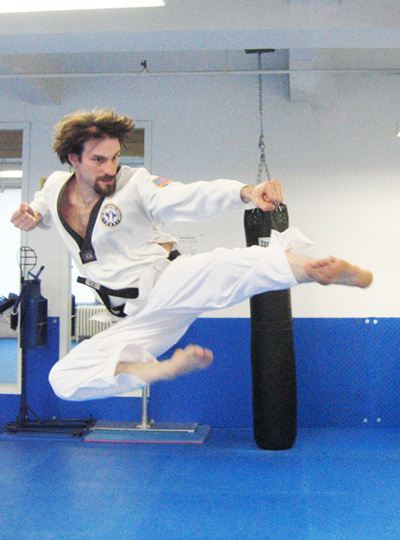 Robert performing a flying side kick